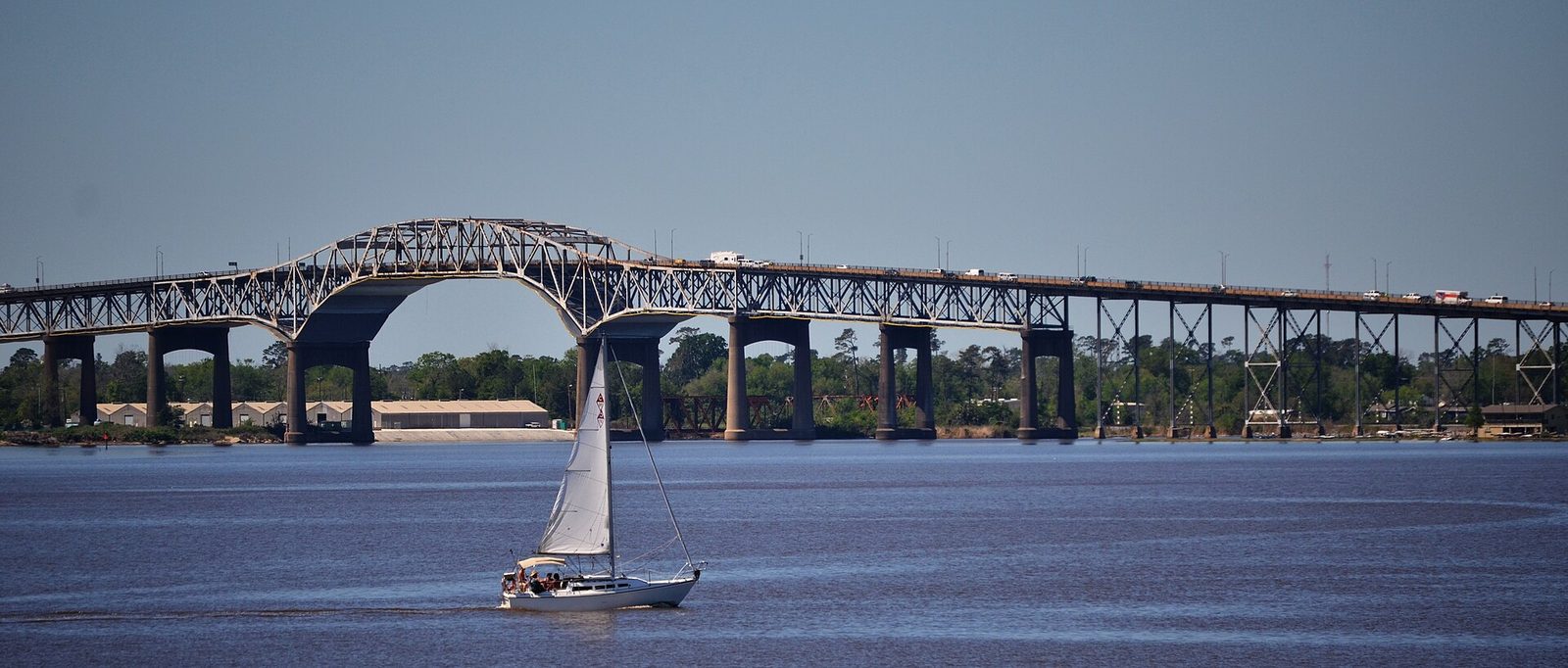 A sailboat on the Calcasieu River below the I-10 bridge in Lake Charles